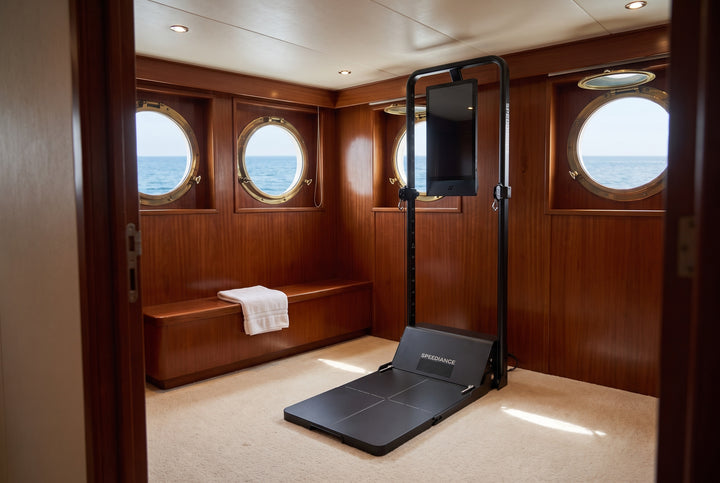 Gym Monster 3 in a mahogany-panelled yacht cabin